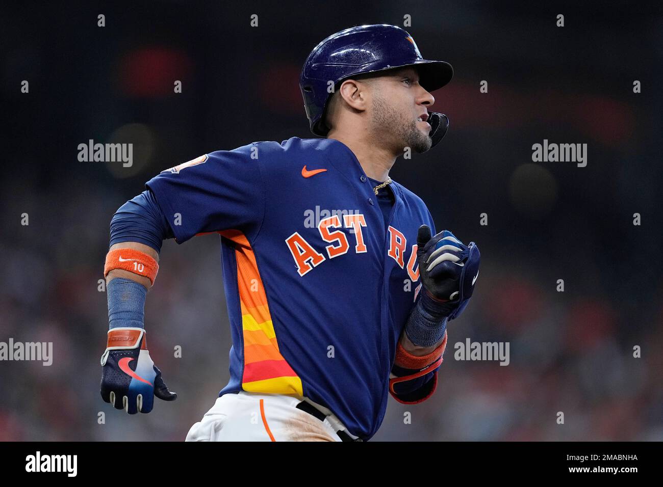 Houston Astros' Yuli Gurriel jogs to first base after a base hit off