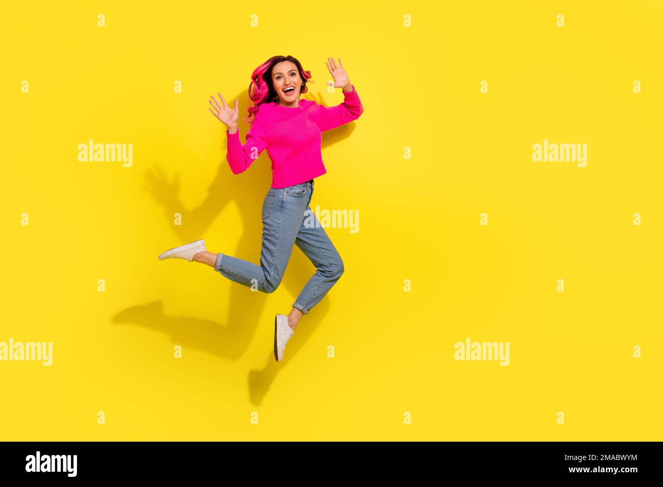 Full length photo of impressed girl dressed vibrant pullover jumping ...