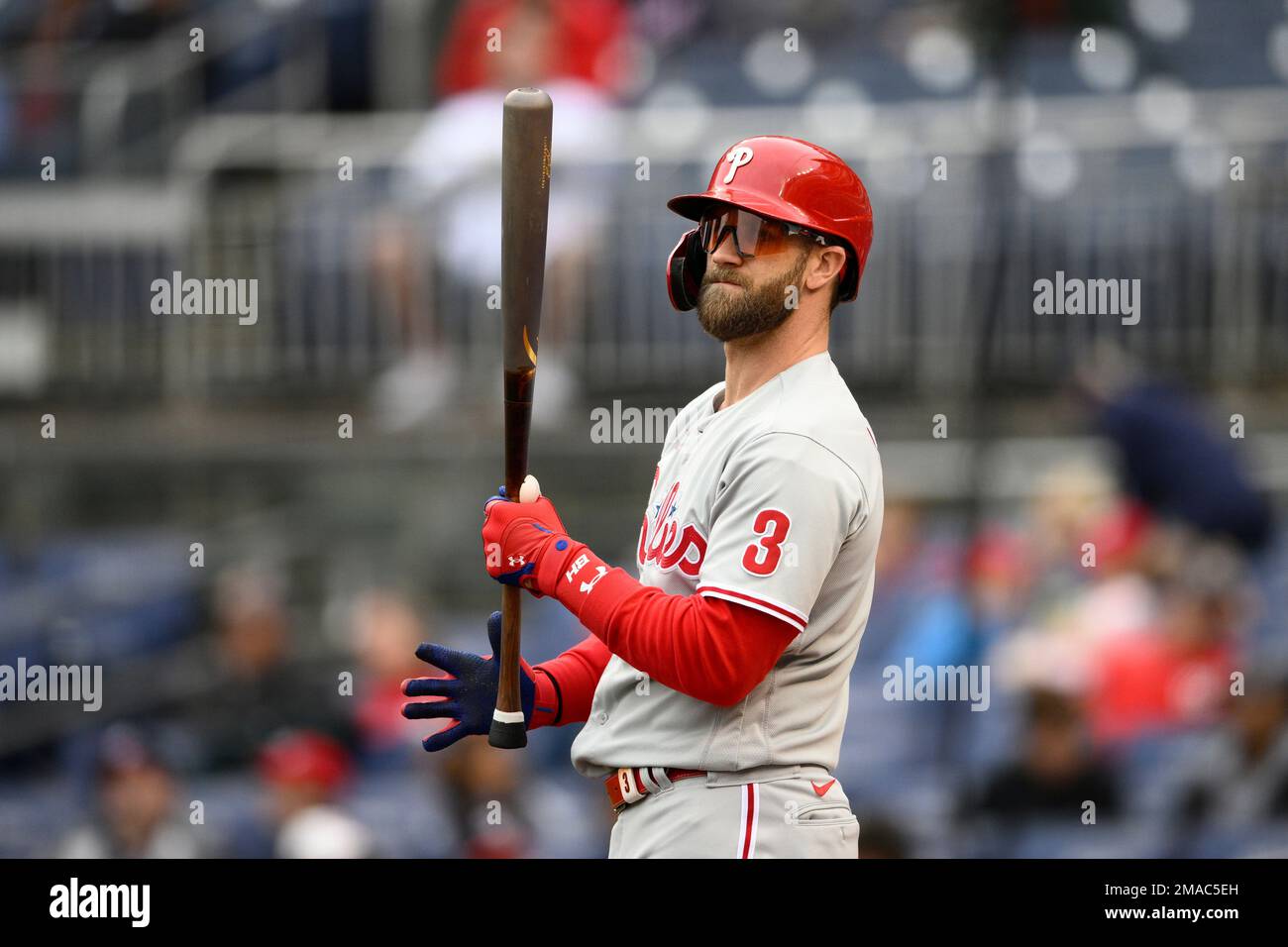 Philadelphia Phillies' Bryce Harper warms up on deck during the third  inning of the first baseball game of a doubleheader against the Washington  Nationals, Saturday, Oct. 1, 2022, in Washington. (AP Photo/Nick