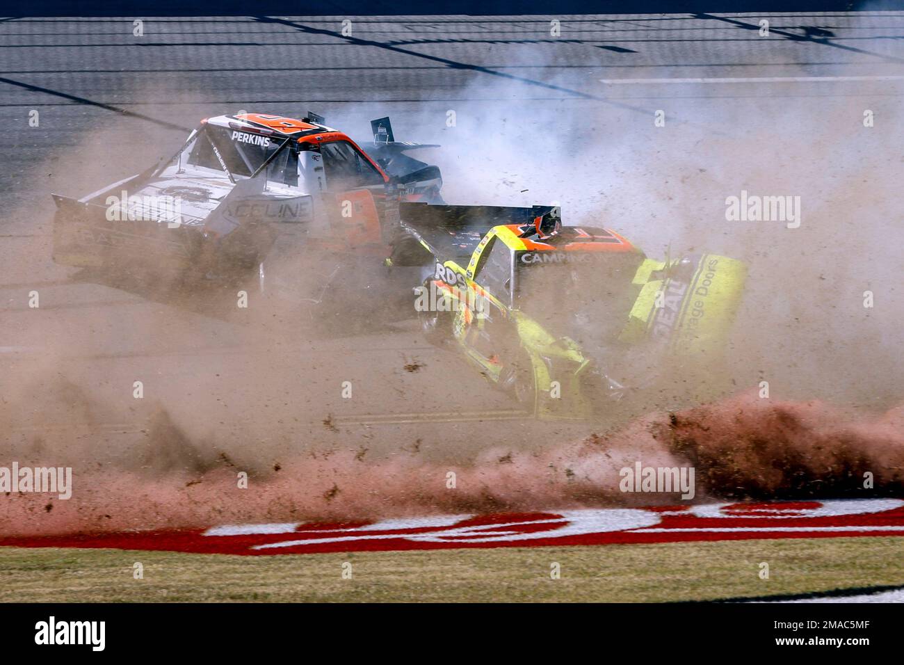 Drivers Blaine Perkins (9) and Johnny Sauter (13) crash on the final ...