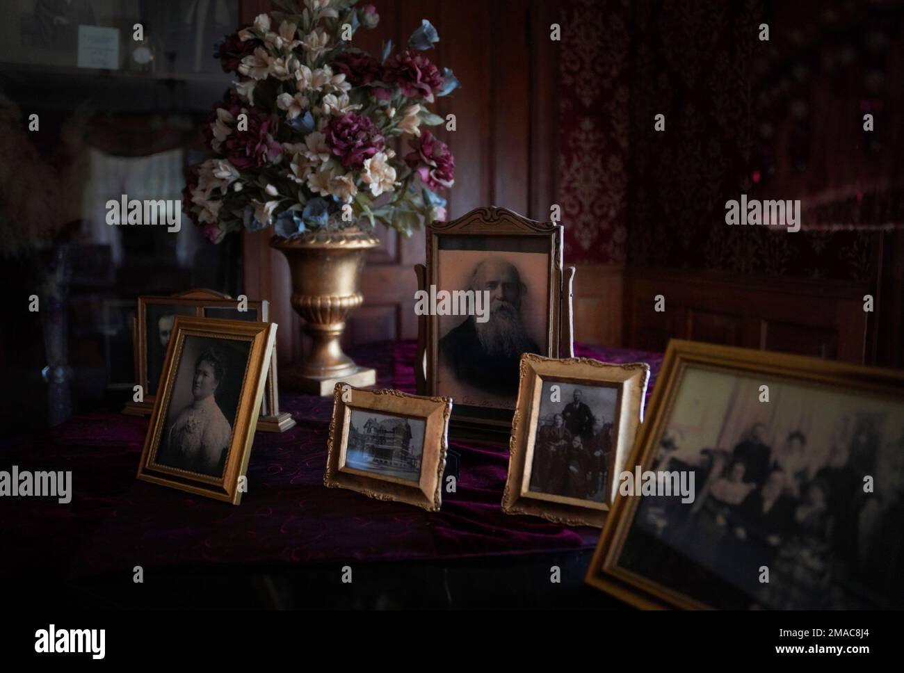 A framed photo of Zion city founder and Christian faith healer, John