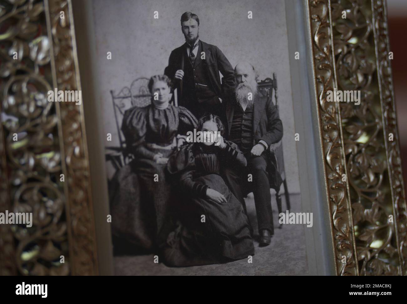 An archival photo of John Alexander Dowie, his wife and two children