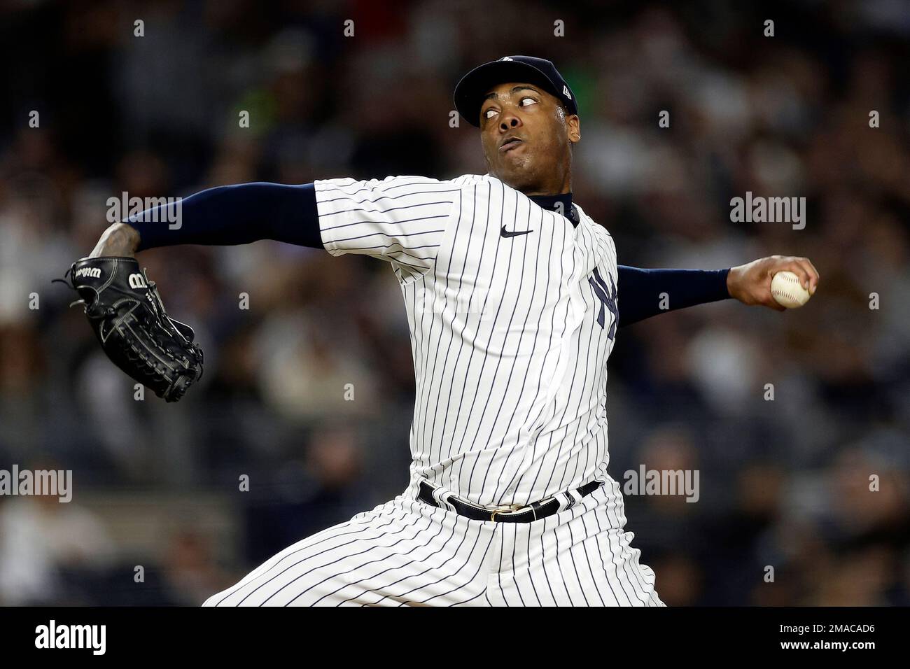New York Yankees pitcher Aroldis Chapman throws during the eighth