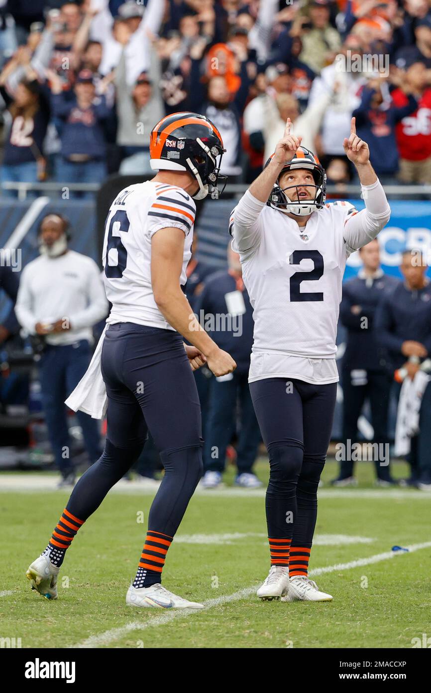 Cairo Santos of the Chicago Bears celebrates with Trenton Gill