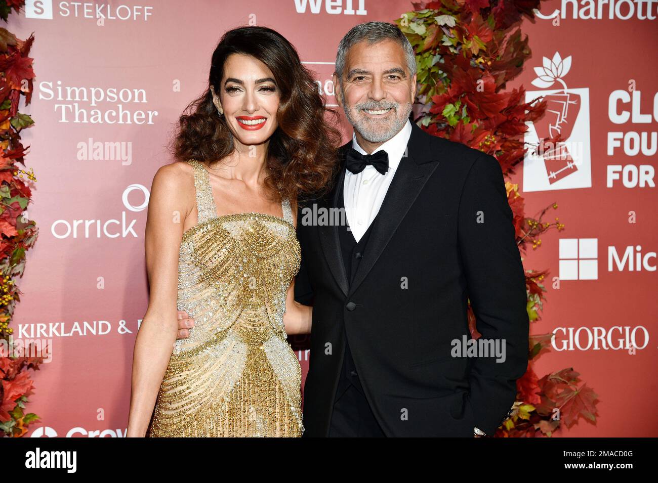 Amal Clooney, left, and George Clooney attend the Clooney Foundation for Justice Albie Awards at The New York Public Library on Thursday, Sept. 29, 2022, in New York. (Photo by Evan Agostini/Invision/AP) Stock Photo