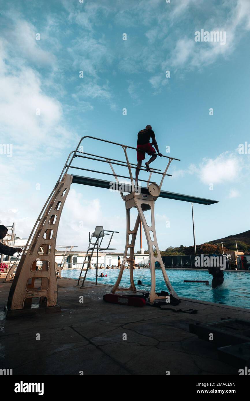 U.S. Marines with 3d Marine Littoral Regiment, 3d Marine Division, leap from the highdive