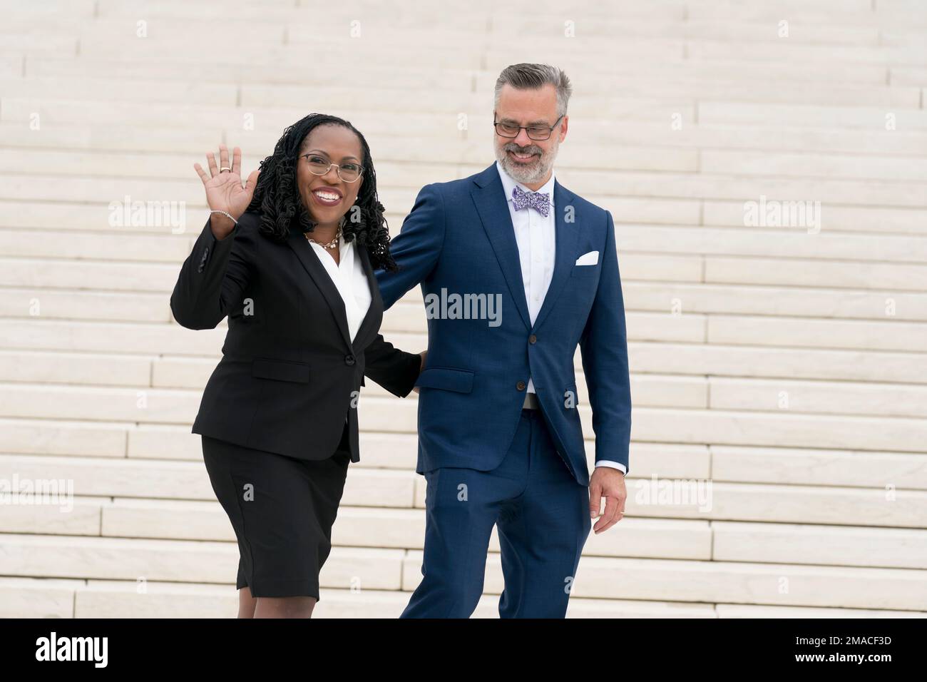 Justice Ketanji Brown Jackson, left, is joined by her husband, Dr ...