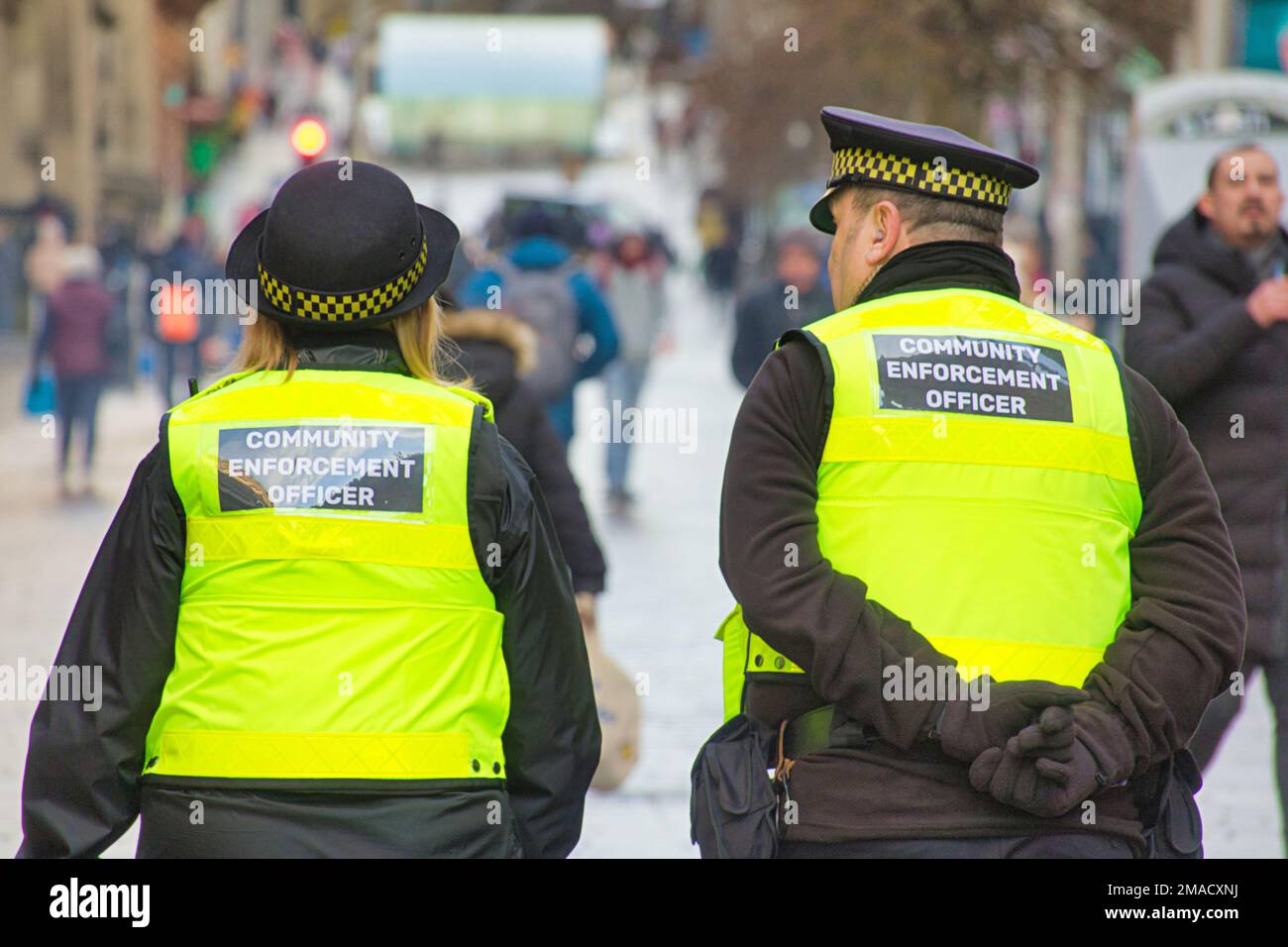 Community enforcement officer or litter police on Buchannan street, the style mile in Glasgow, Scotland, UK Stock Photo