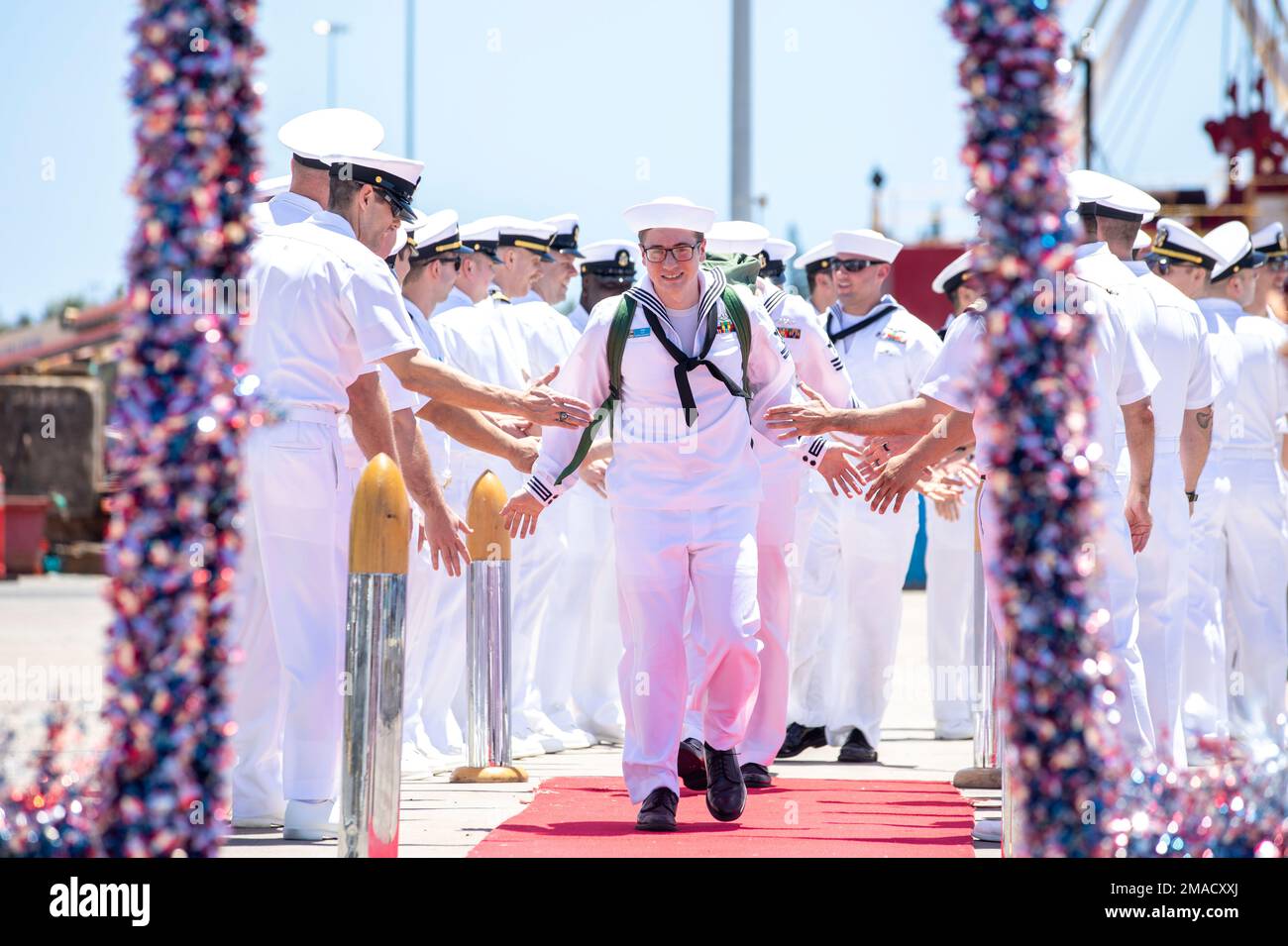 220512-N-XG173-1258 JOINT BASE PEARL HARBOR-HICKAM (May. 25, 2022) Machinists Mate (Nuclear) 2nd Class Jon Tedder, from Atlanta, assigned to the Virginia-class fast-attack submarine USS North Carolina (SSN 777) returns home after the boat returns to Joint Base Pearl Harbor-Hickam from deployment in the 7th Fleet area of responsibility. The Virginia-class fast-attack submarine USS North Carolina (SSN 777) returns to Joint Base Pearl Harbor-Hickam from deployment in the 7th Fleet area of responsibility. North Carolina performed a full spectrum of operations, including anti-submarine and anti-sur Stock Photo
