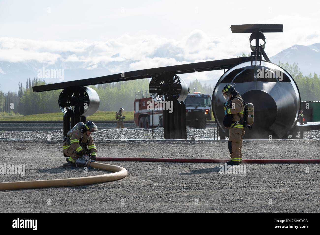 Air Force fire protection specialists assigned to the 673d Civil