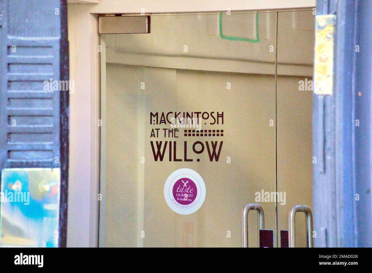 front door entrance Mackintosh at the Willow (the Original Willow Tearooms Building) is situated at 215–217 Sauchiehall St, Glasgow, G2 3EX. Stock Photo