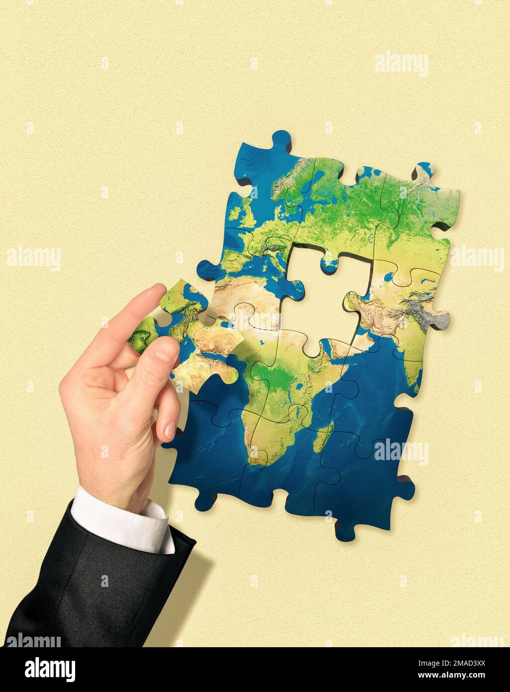 Games played around the world. Political crises in the world. Disputes that cause wars. World map depiction through puzzle. Photo manipulation. Stock Photo