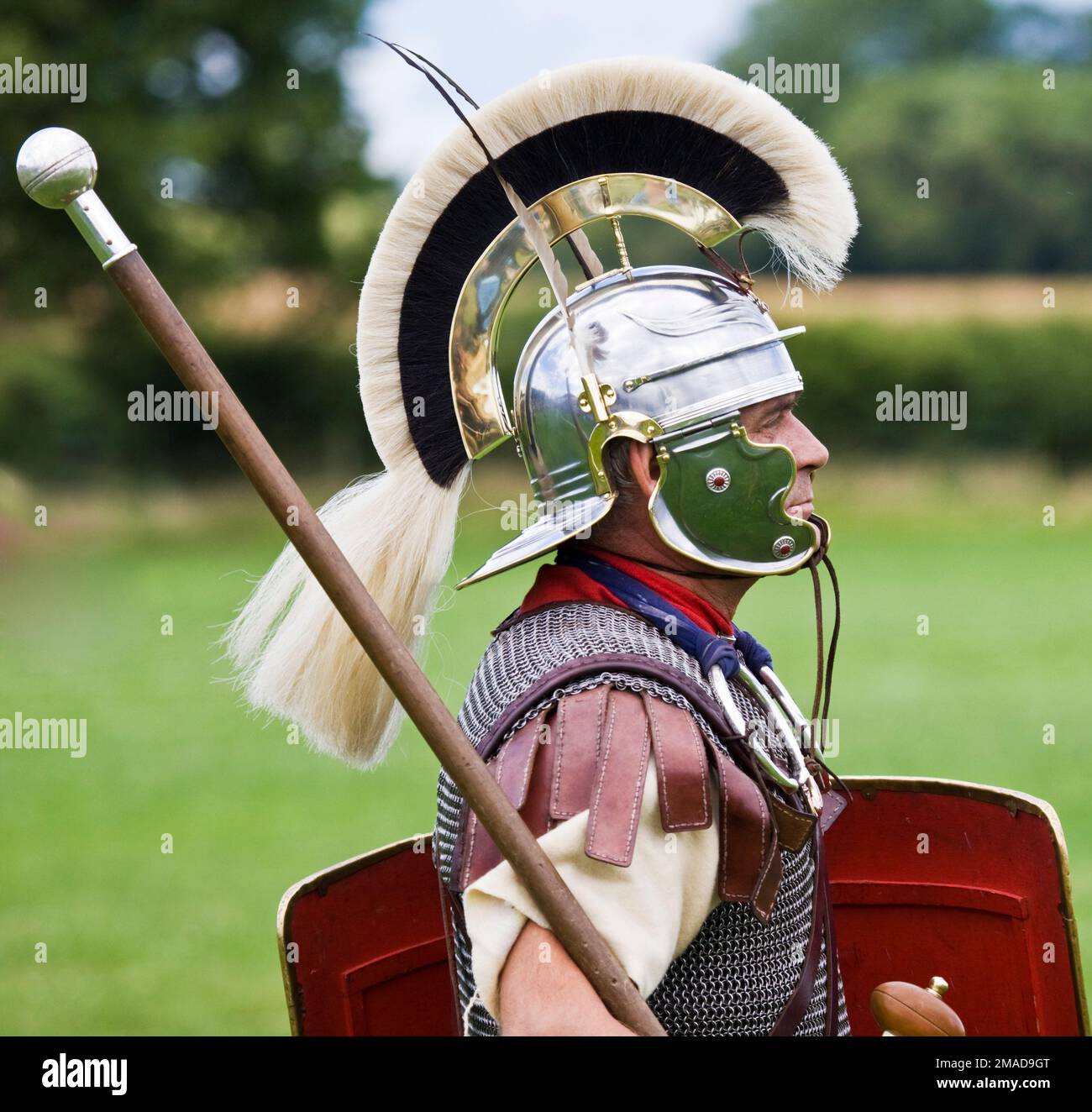 Roman Army Optio - Deputy Centurion, in plumed helmet & knob ended staff of office Stock Photo
