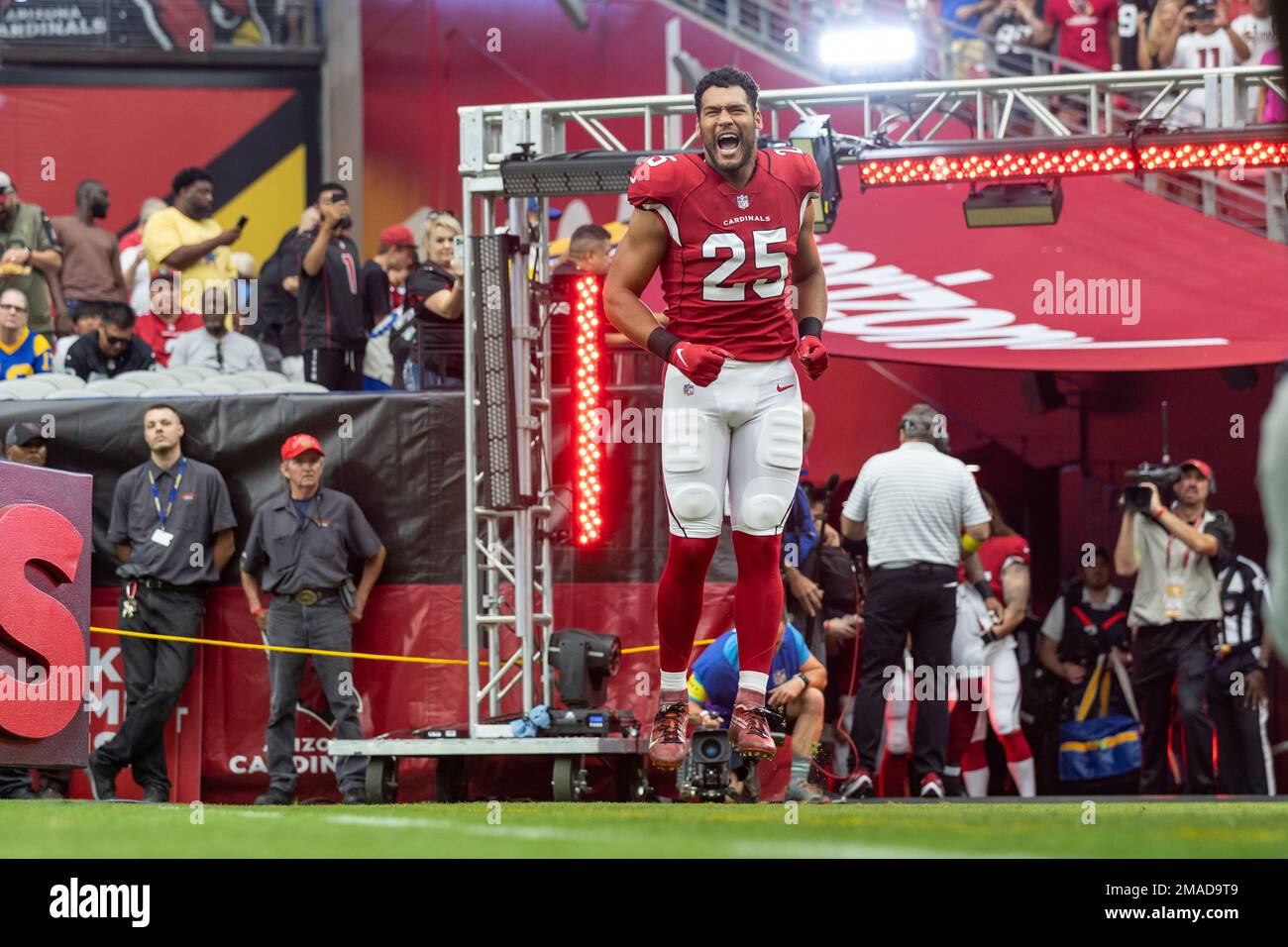 Linebacker (25) Zaven Collins of the Arizona Cardinals enters the field
