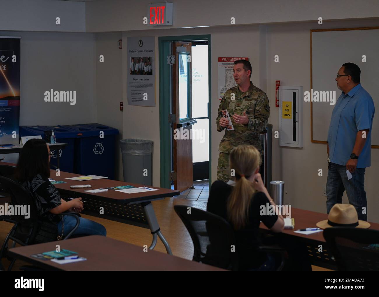 Col. Eric M. Flake, Joint Base Lewis-McChord medical director, greets ...