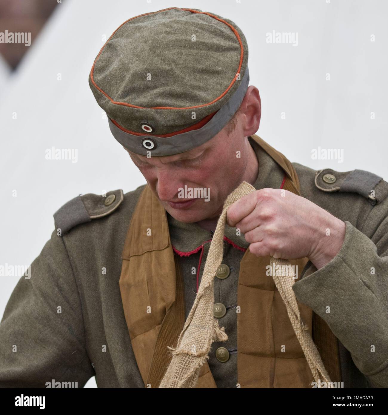 WW1 German Imperial Army Infantryman in M1907 Field Cap with cockades Stock Photo