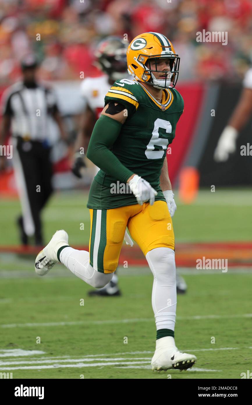 Green Bay Packers safety Dallin Leavitt (6) runs down the field