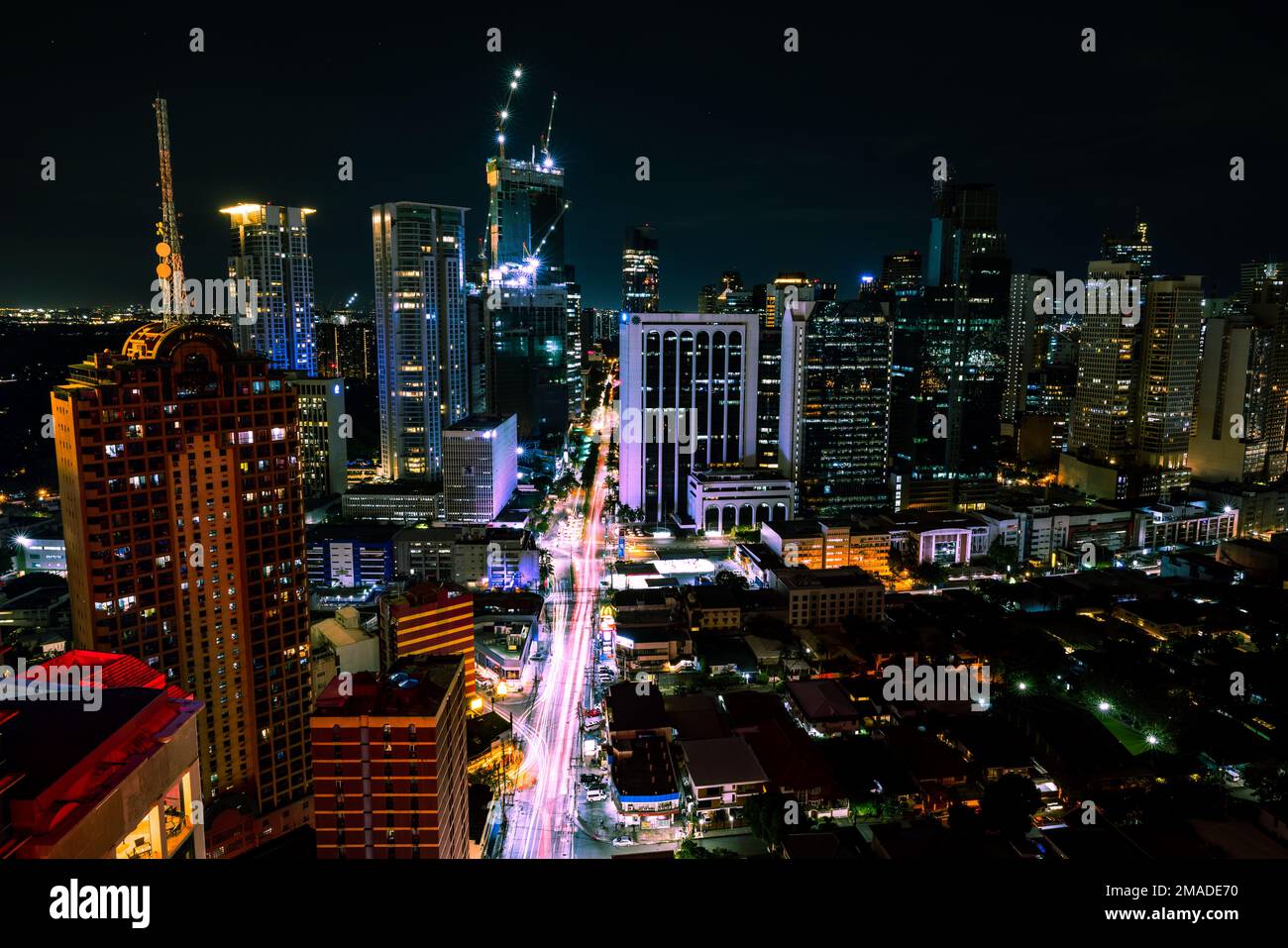 The manila city building center at night Stock Photo - Alamy