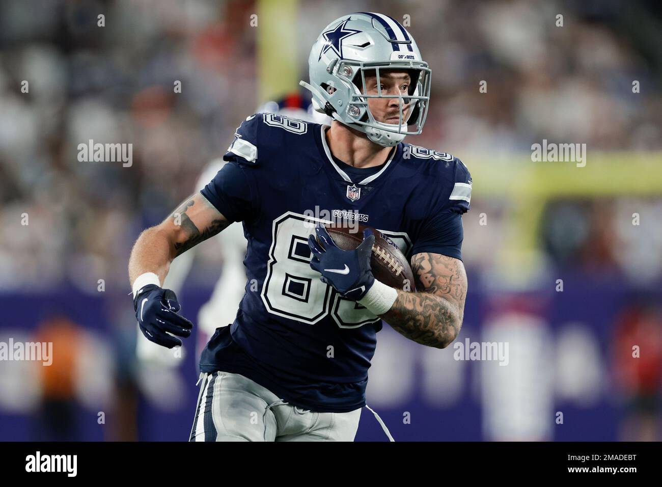 Dallas Cowboys tight end Peyton Hendershot (49) runs after a reception  during the NFL football team's rookie minicamp in Frisco, Texas, Friday,  May 13, 2022. (AP Photo/Michael Ainsworth Stock Photo - Alamy