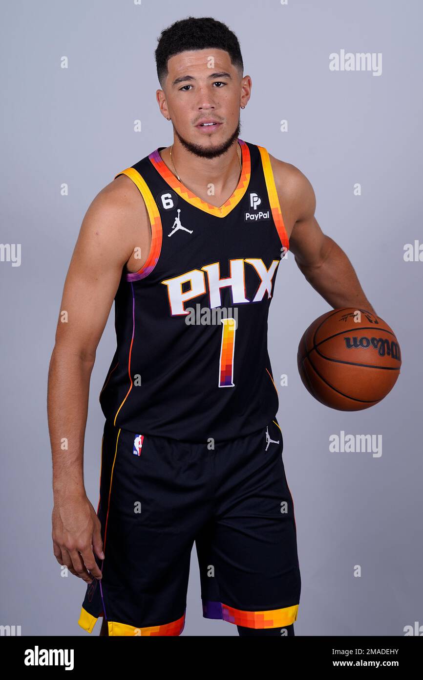 Phoenix Suns' Devin Booker poses for a photo during an NBA basketball