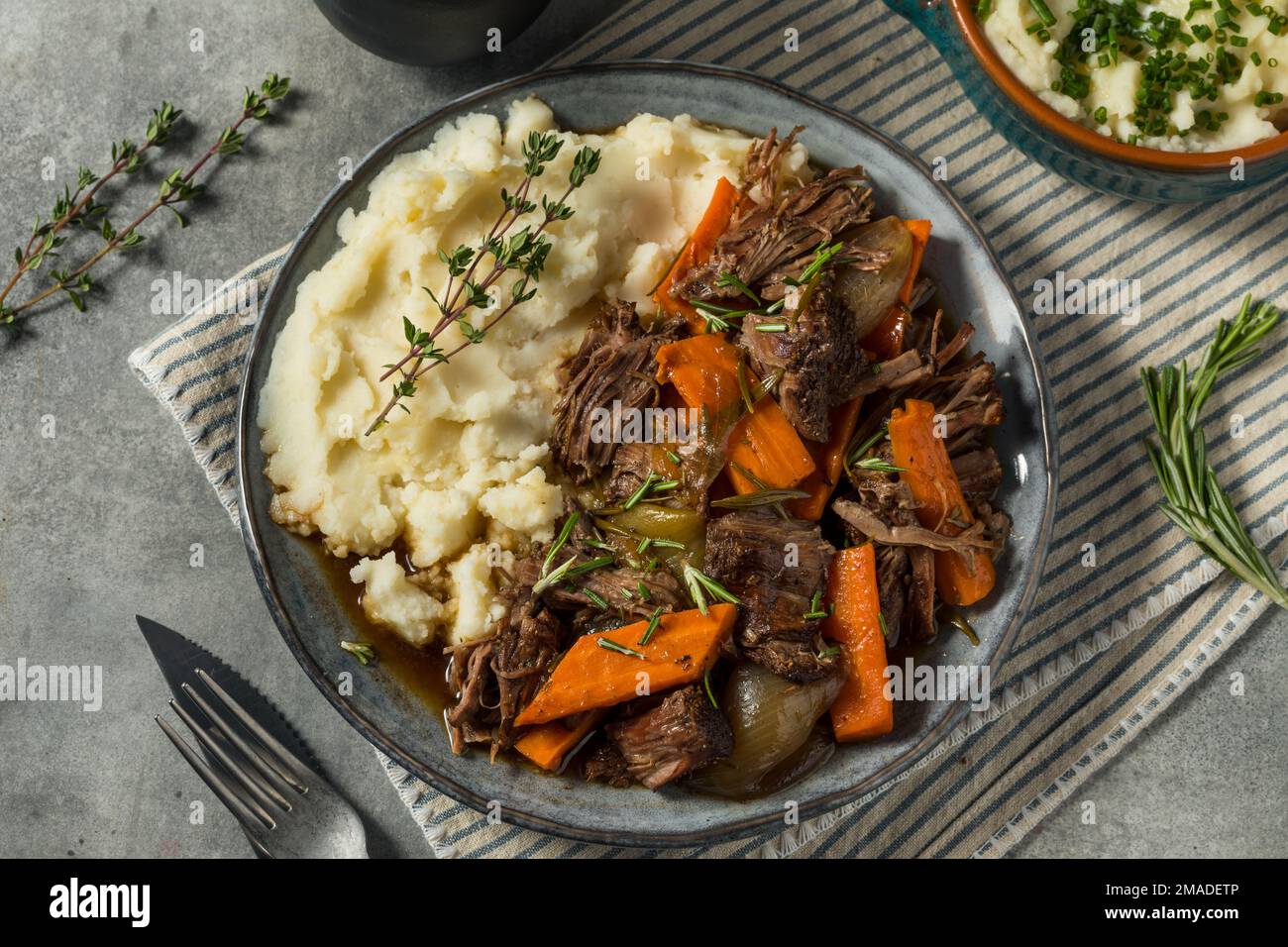 Homemade Beef Pot Roast with Carrots and Mashed Potatoes Stock Photo ...