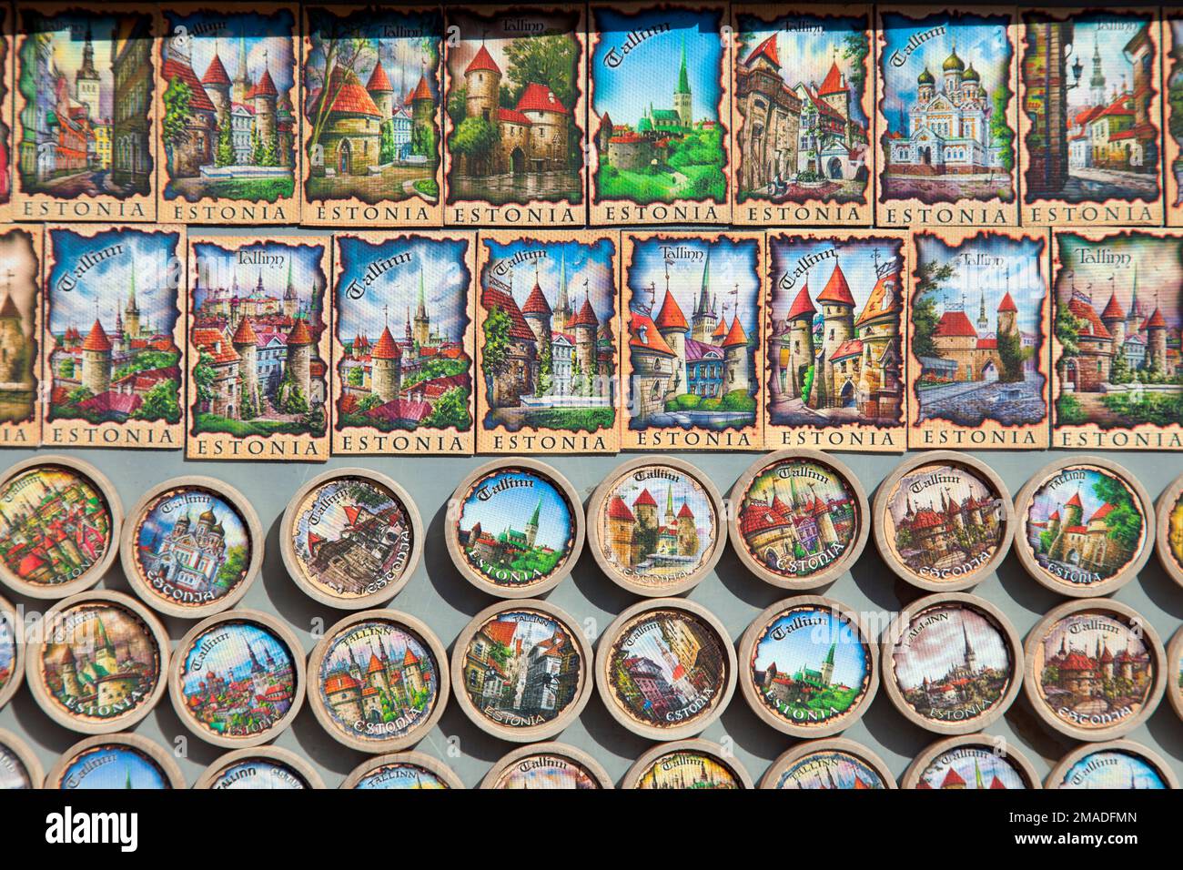 Estonia, Tallinn, tourist souvenirs, fridge magnets on market stall, depicting scenes of Tallinn. Stock Photo