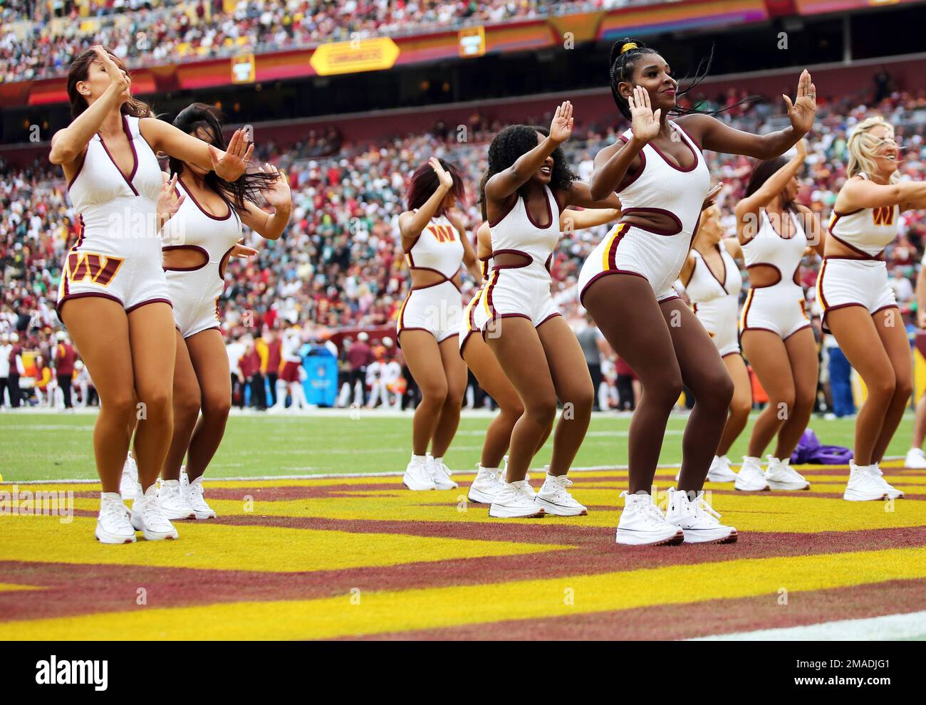 Washington Commanders cheerleaders perform during an NFL football game 