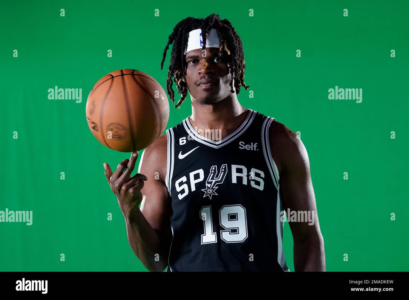 San Antonio Spurs forward Alize Johnson (19) poses for photos during ...