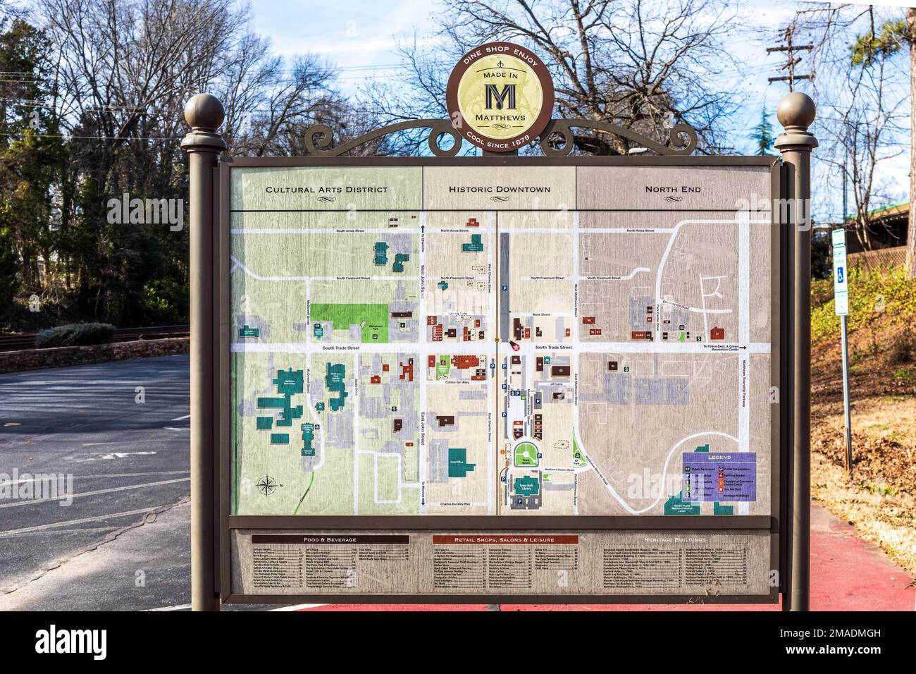 MATTHEWS, NC, USA-15 JANUARY 2023: Close-up of large poster map of town of Matthews, showing major points of interest.  Sunny, blue sky day. Stock Photo