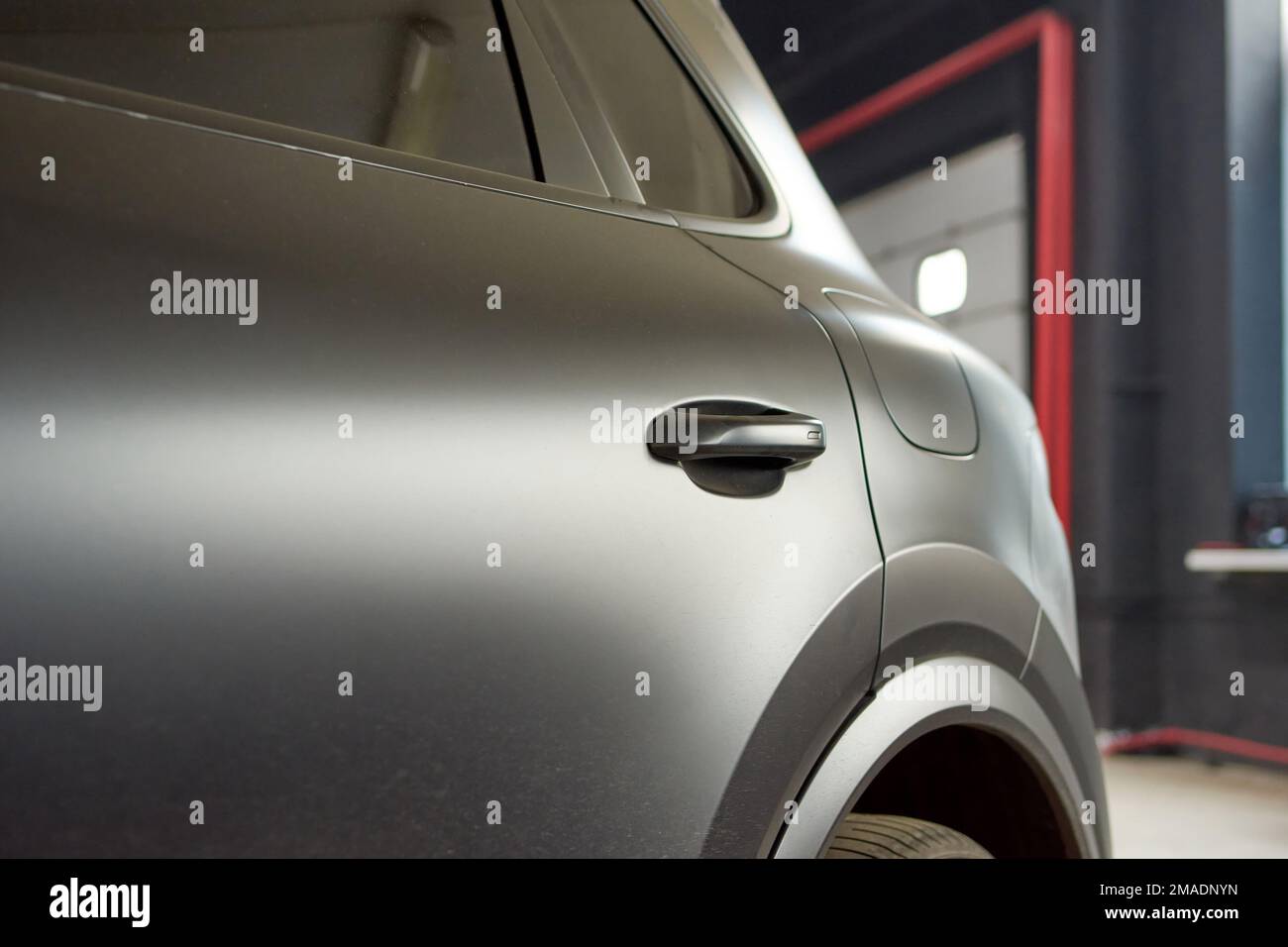 Installation of a protective paint and varnish matte film on the car