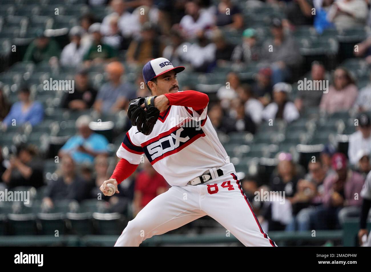 Chicago White Sox starting pitcher Dylan Cease (84) stands on the