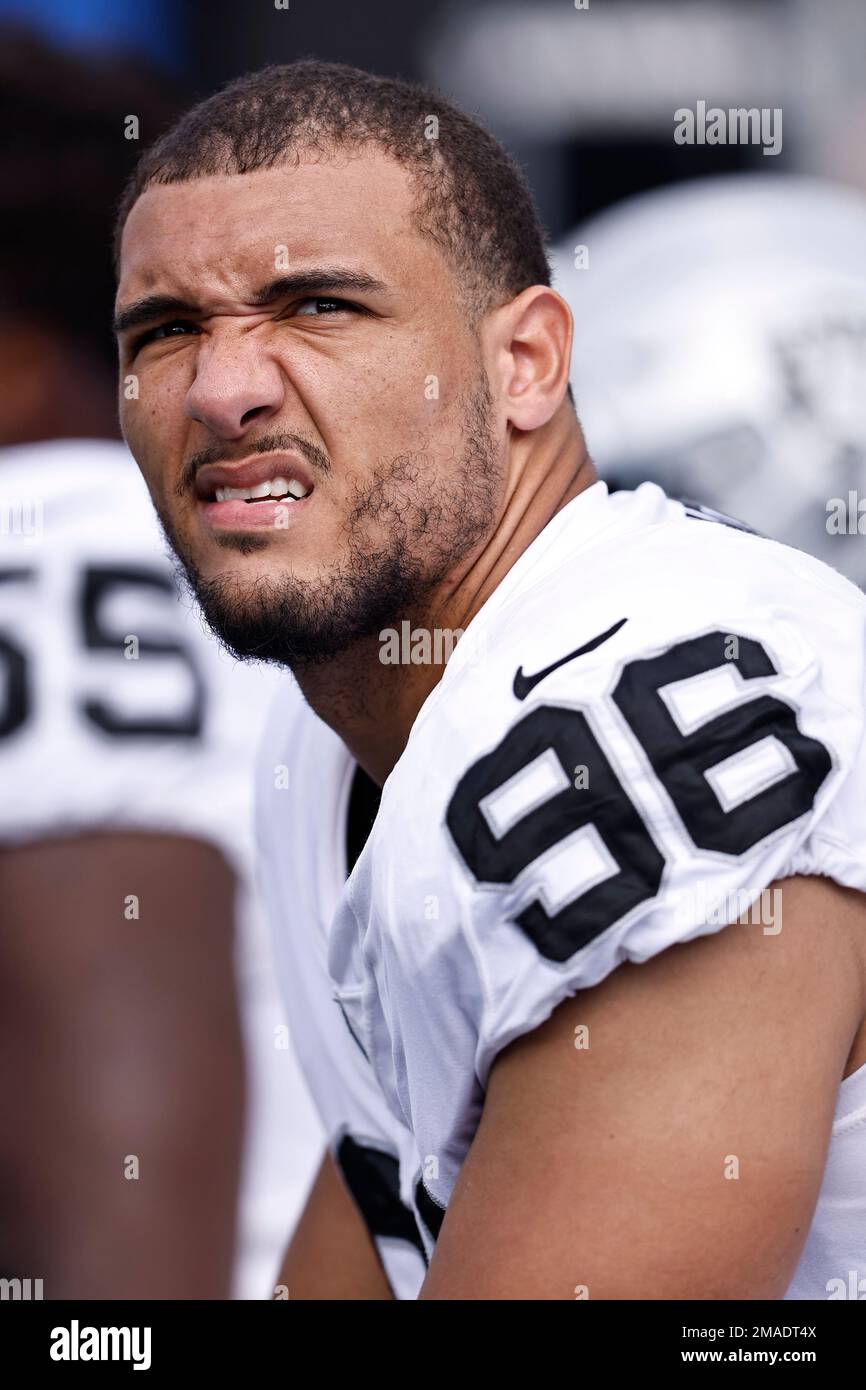 Las Vegas Raiders defensive end Tashawn Bower (96) takes a break on the  sideline during their game against the Tennessee Titans Sunday, Sept. 25,  2022, in Nashville, Tenn. (AP Photo/Wade Payne Stock