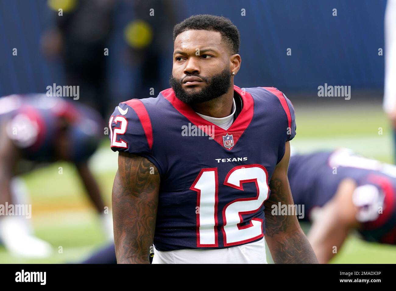 Houston Texans wide receiver Nico Collins stretches before an NFL football  game against the Chicago Bears Sunday, Sept. 25, 2022, in Chicago. (AP  Photo/Charles Rex Arbogast Stock Photo - Alamy