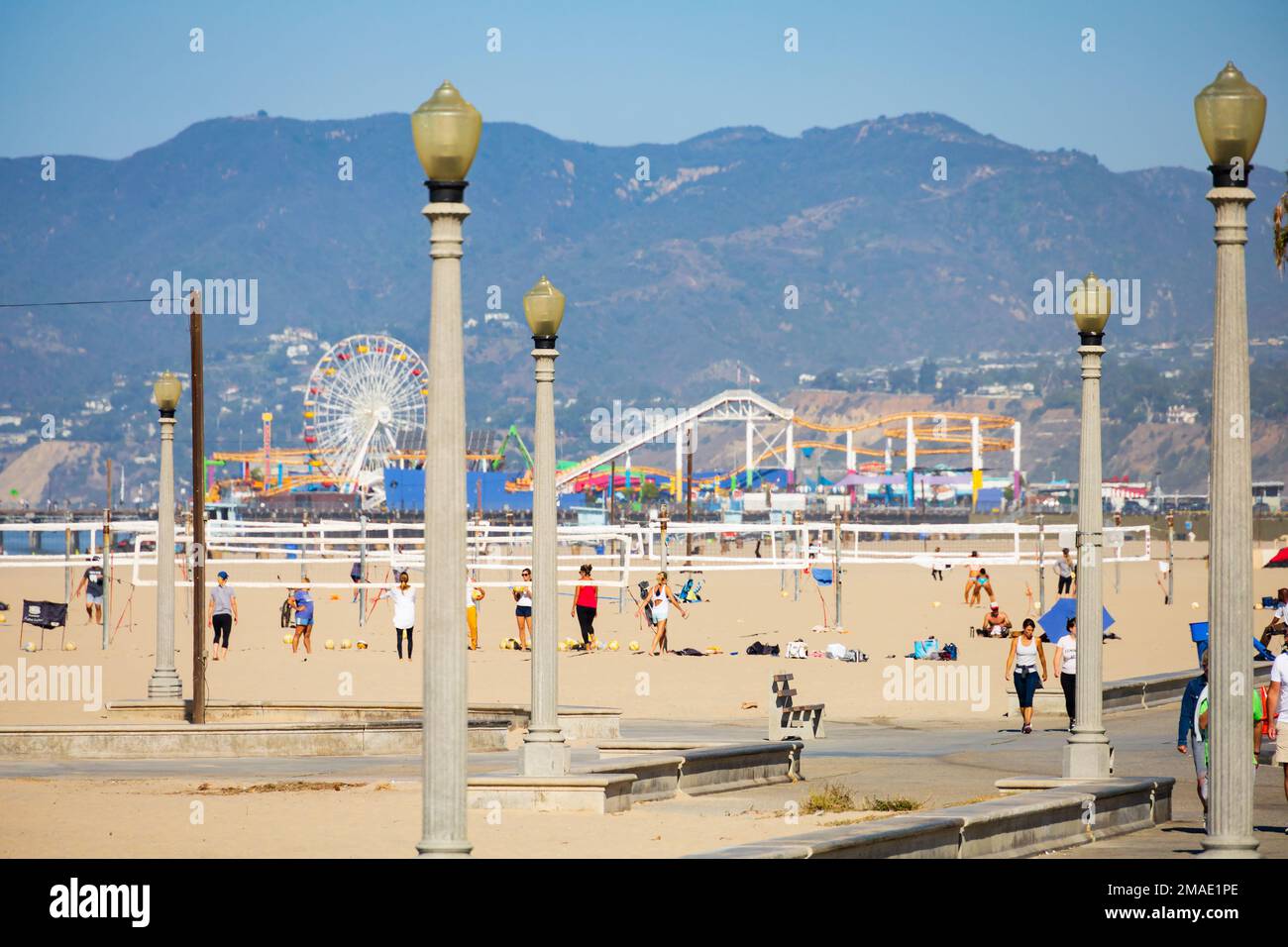Playing volleyball on the beach, Santa Monica, California, USA Stock Photo