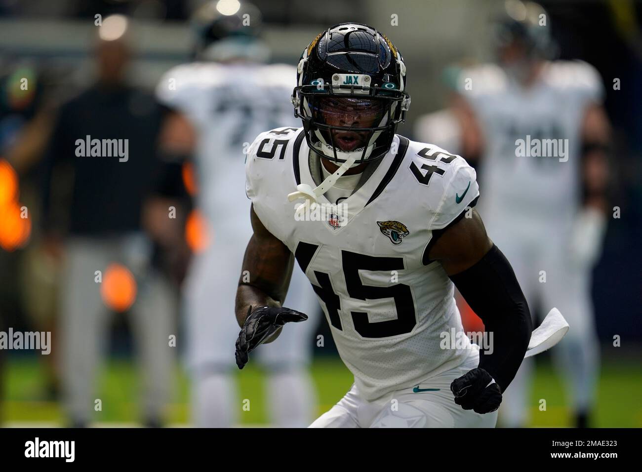 Jacksonville Jaguars linebacker K'Lavon Chaisson (45) warms up