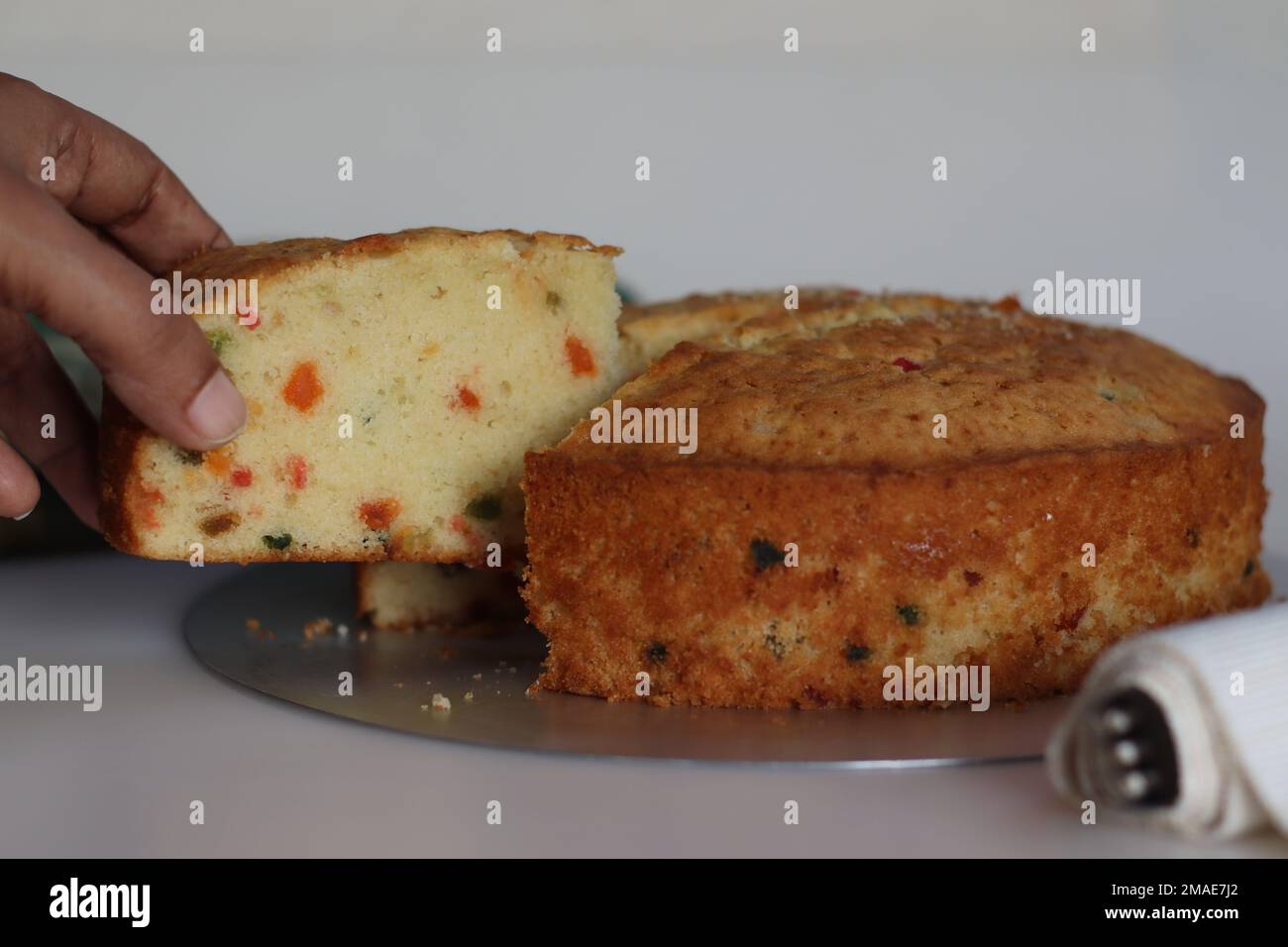 Sliced Tutti fruity buttermilk cake. A type of Indian fruit cake made