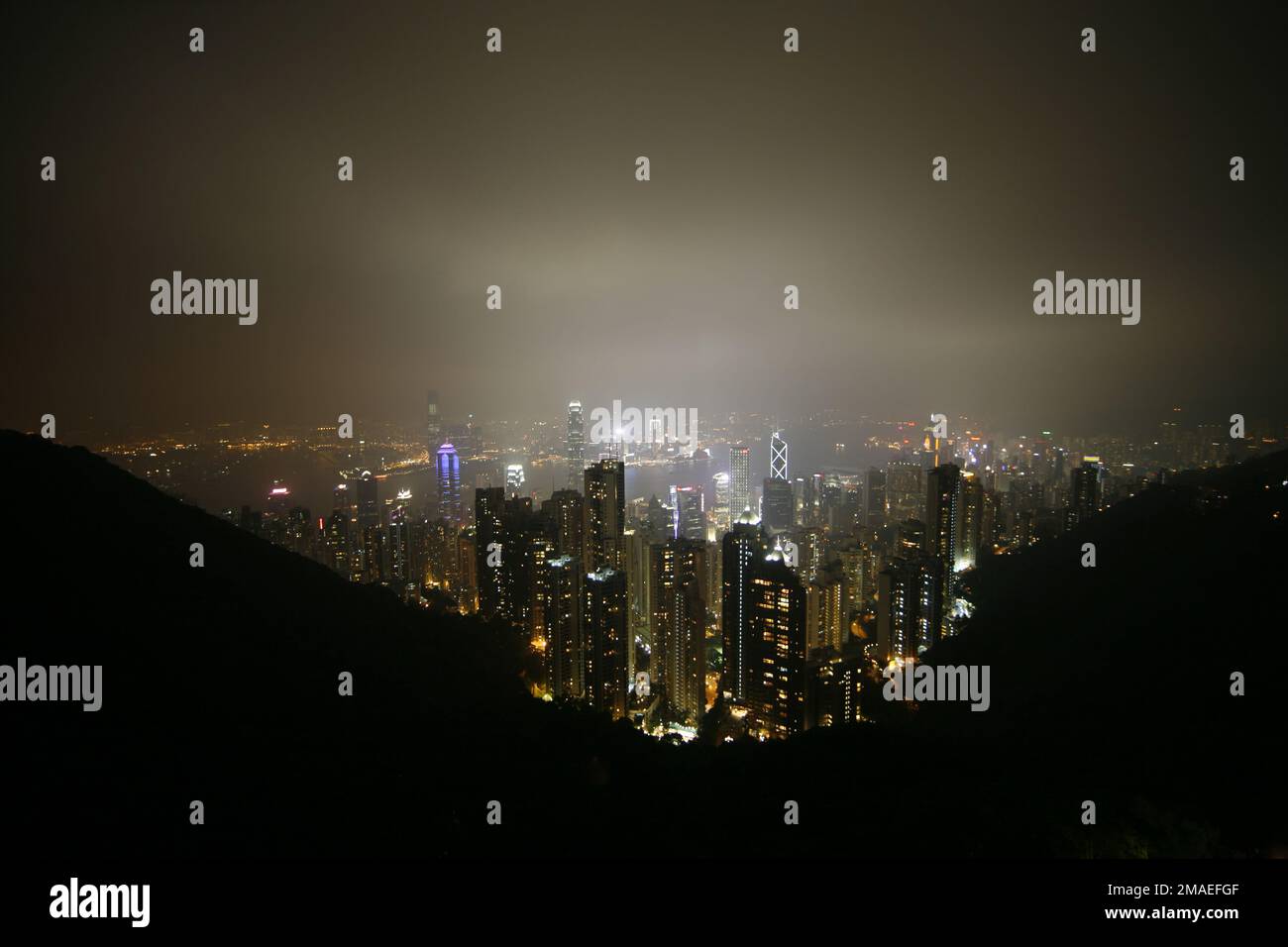 Hong Kong city skyline from Victoria peak at night Stock Photo - Alamy