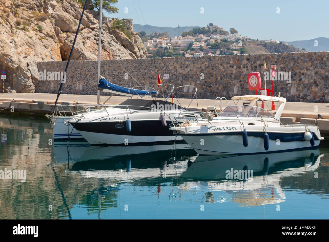 LA HERRADURA, SPAIN - 17 MAY 2022 The Marina del Este port, in a very beautiful natural and privileged position between the mountains and the sea, ser Stock Photo