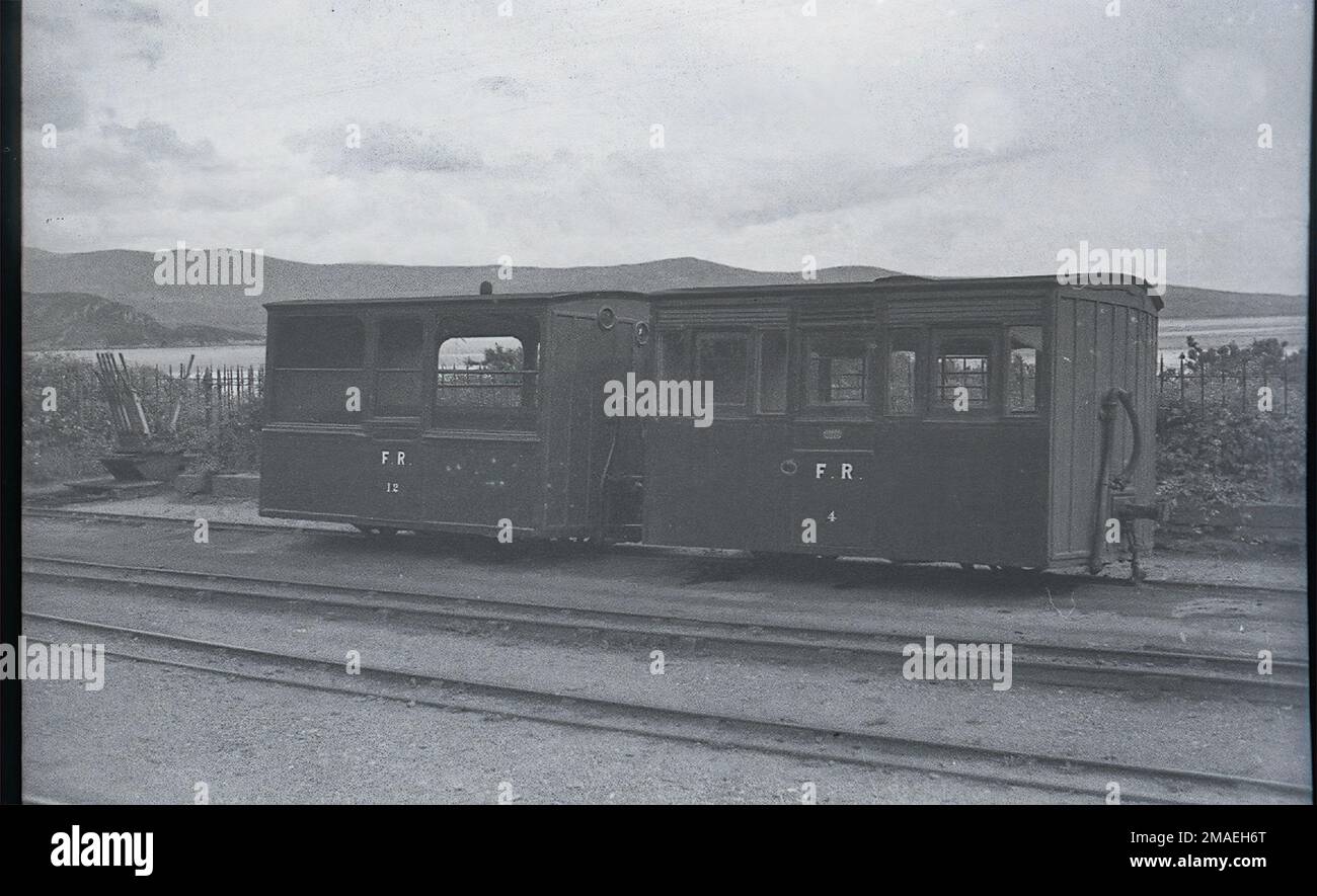 Two Ffestiniog Railway 4-wheel carriages (Nos. 4 & 12) at Porthmadog Station in the 1930s Stock Photo