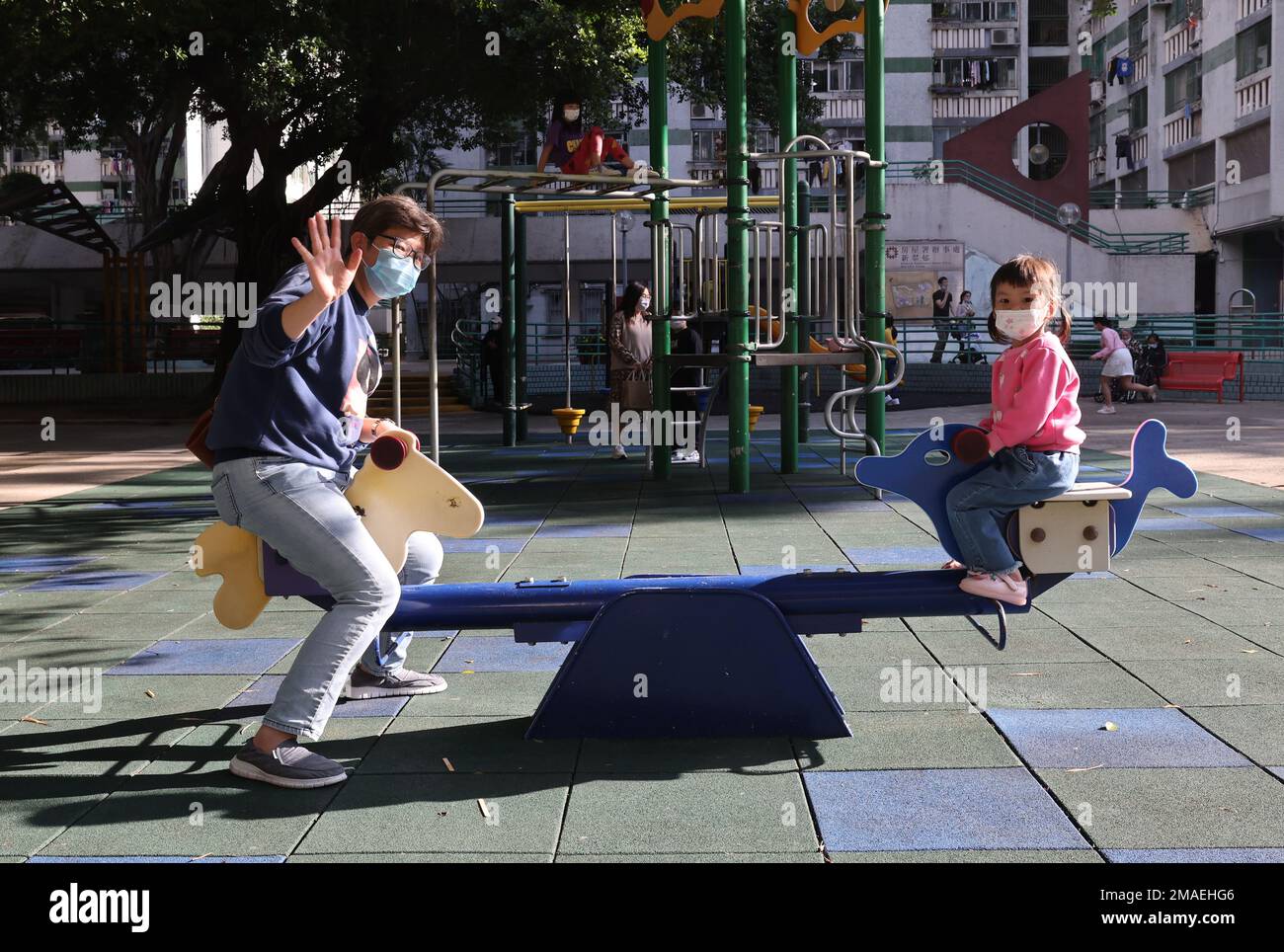 Samantha Tong, 43, resident of Sun Chui Estate in Tai Wai and her daughter  Gwyneth Ng, 4-years-old playing at a playground at Sun Chui Estate, Tai  Wai. Tong, who has lived in