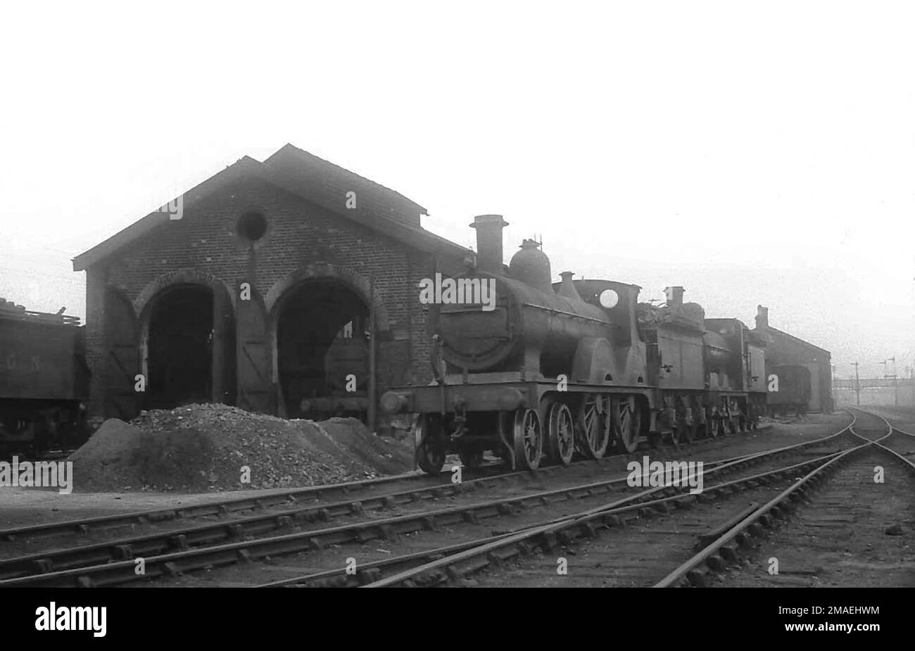 A line of locomotives outside Spalding M&GN locomotive shed in the 1930s Stock Photo