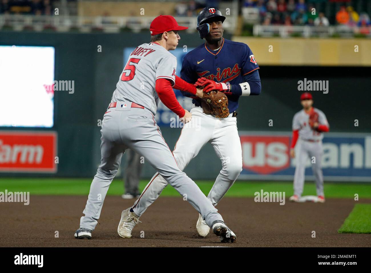 Los Angeles Angels third baseman Matt Duffy (5) tags out Minnesota Twins'  Nick Gordon to complete a double play during the first inning of a baseball  game Friday, Sept. 23, 2022, in
