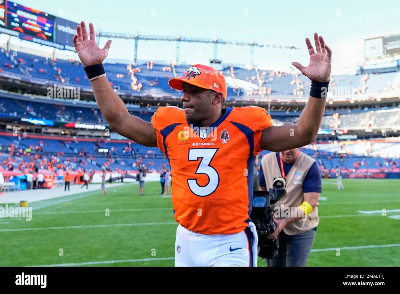 Denver Broncos quarterback Russell Wilson (3) reacts as he leaves the ...