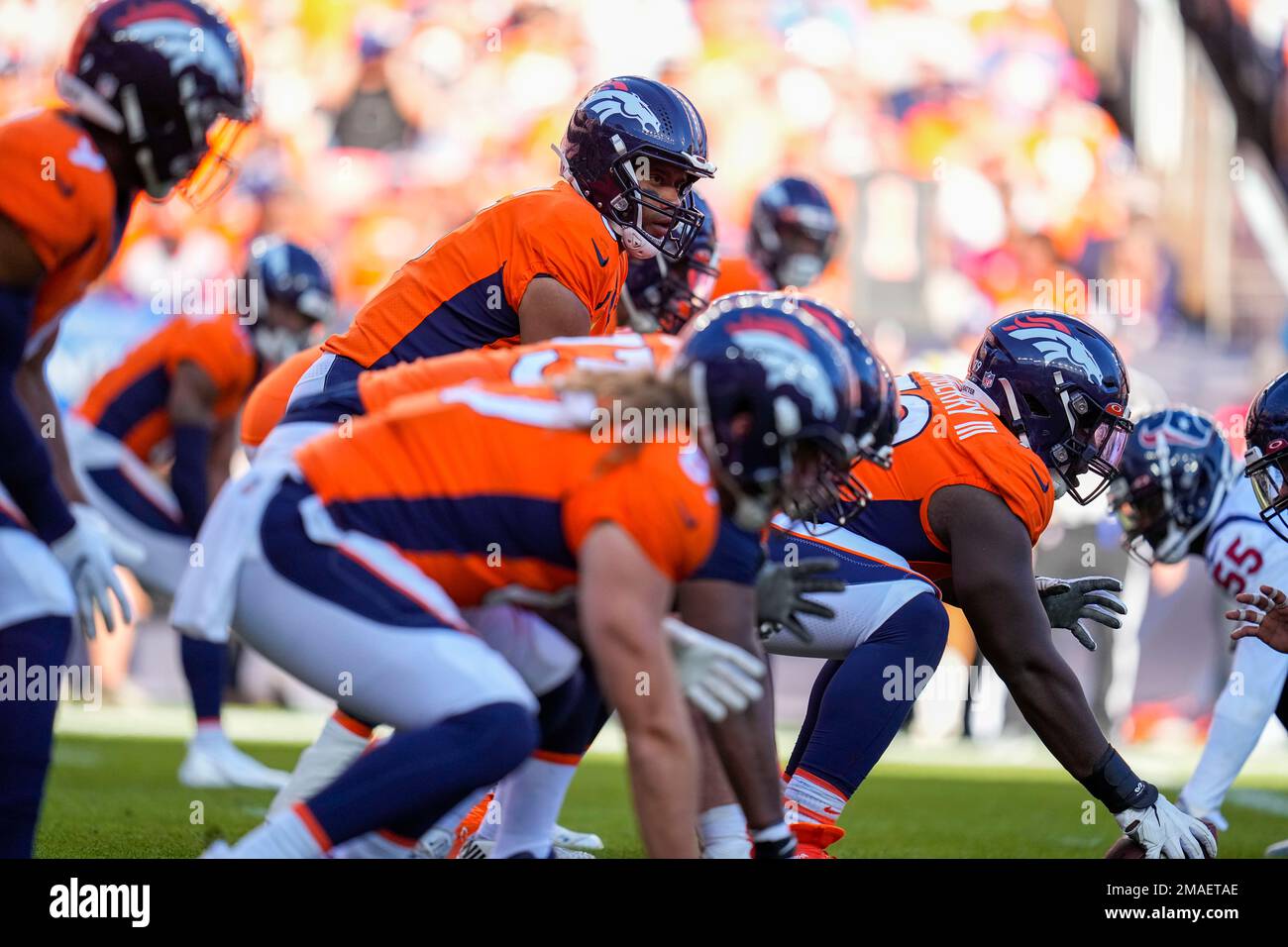 Denver Broncos quarterback Russell Wilson (3) lines up against the ...