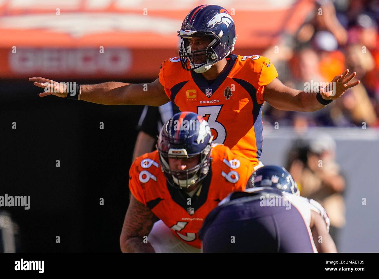 Denver Broncos quarterback Russell Wilson (3) signals against the ...