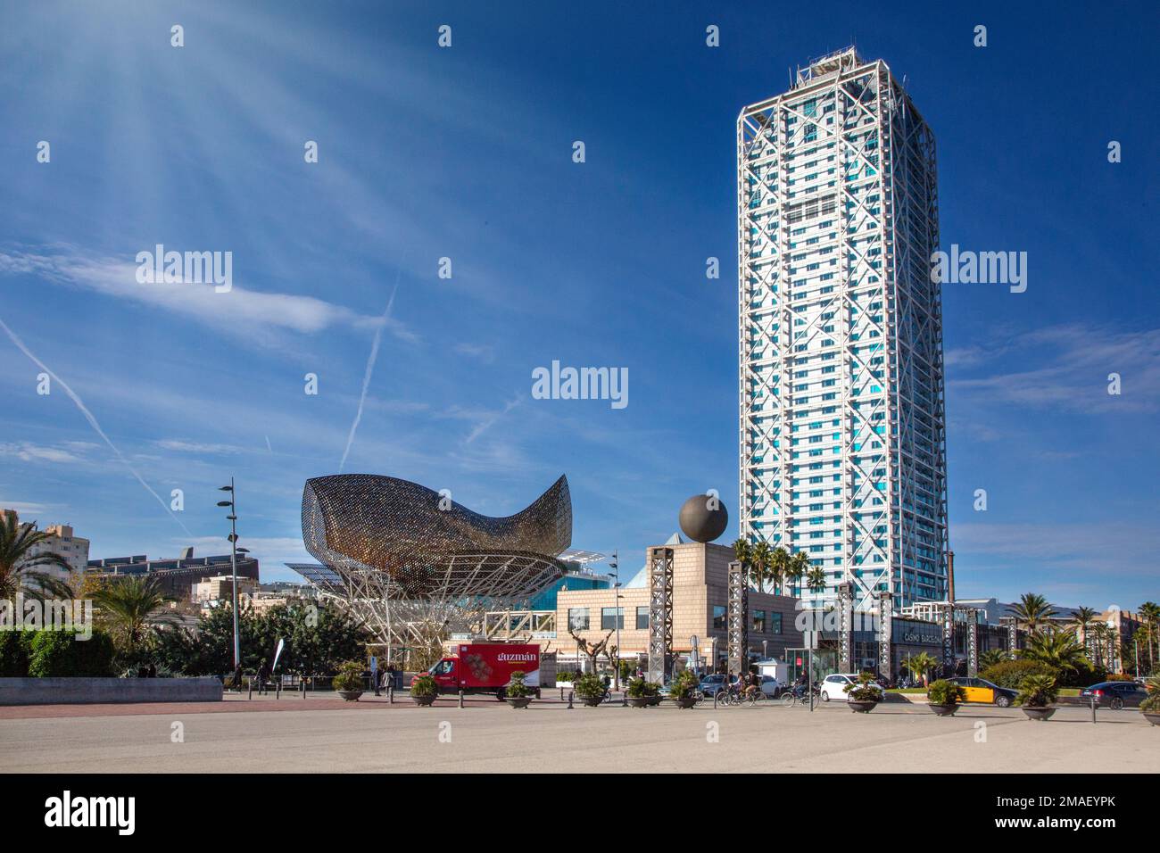 Barcelona, Spain December 15, 2018: Hotel Arts and Peix sculpture in Port Olimpic on August 12, 2011 in Barcelona, Spain. The sculpture designed by Fr Stock Photo