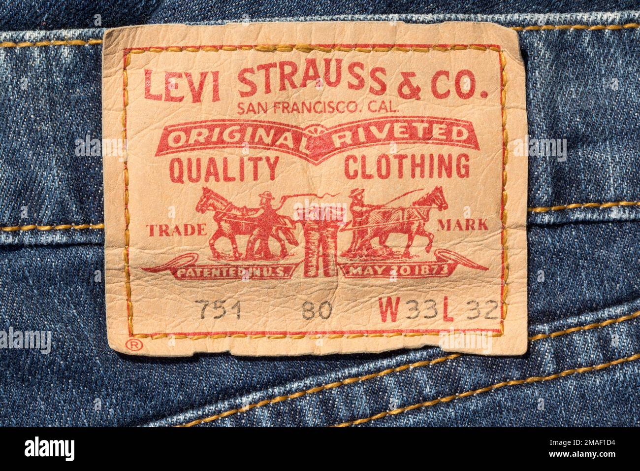 Chisinau, Moldova - August 19, 2016: Closeup of Levi's leather jeans label sewed on a blue jeans isolated on white background.Levi Strauss & Co is a p Stock Photo