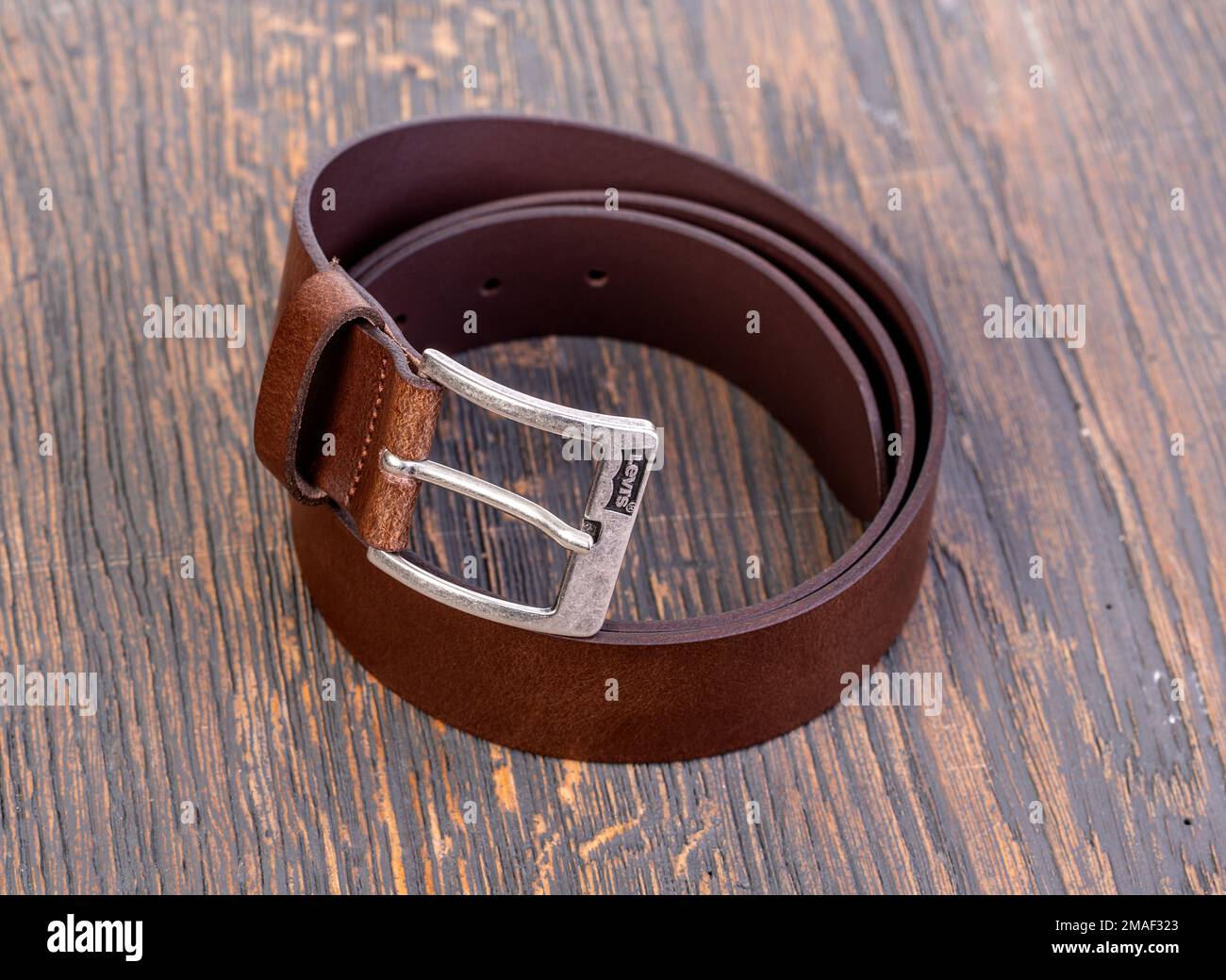 Chisinau, Moldova February 08, 2019:. Leather belt Levis on wooden background Stock Photo