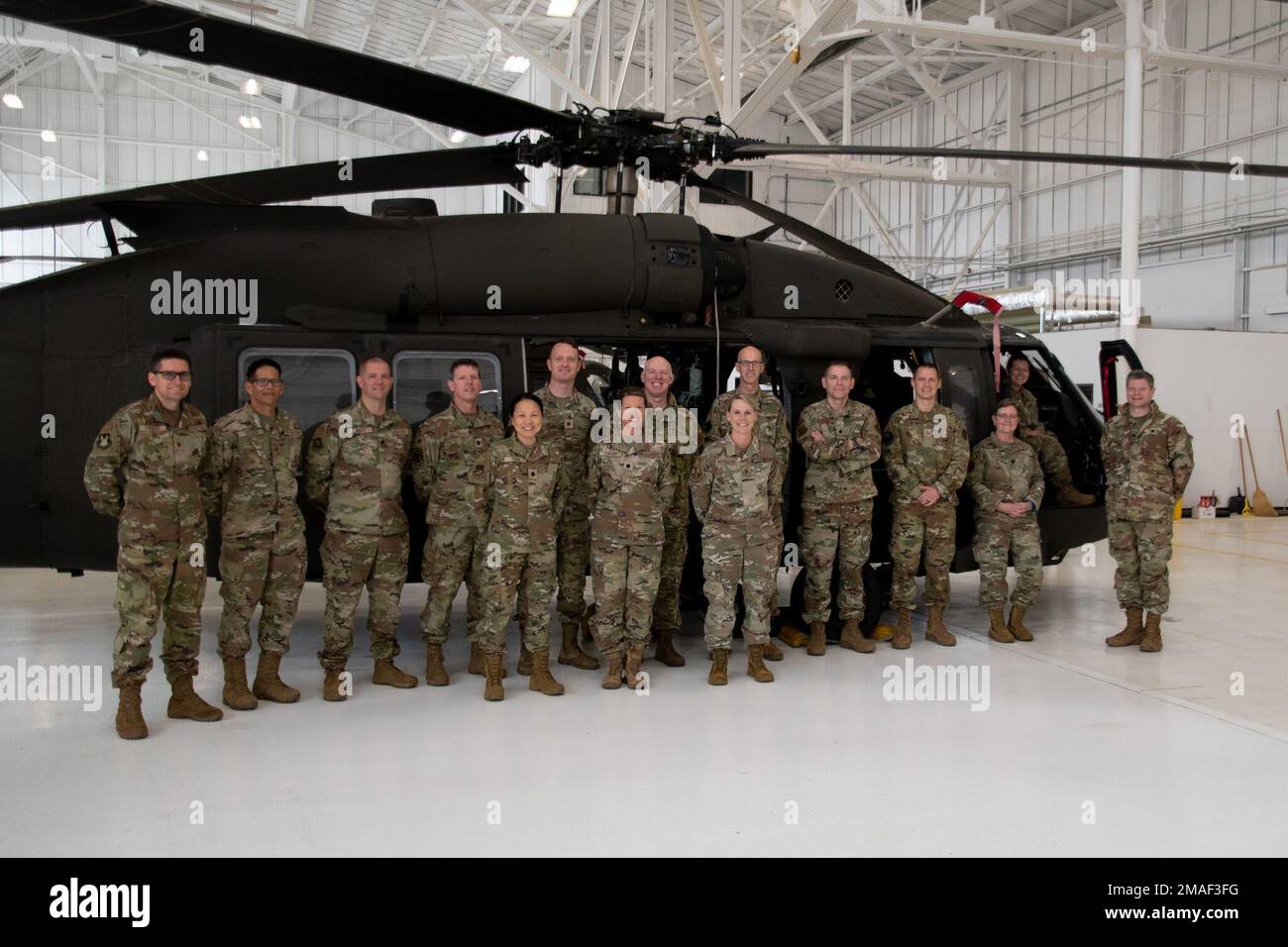 Students of the optometry Top Eye course tour a Kansas Army National Guard Blackhawk helicopter hangar. Stock Photo