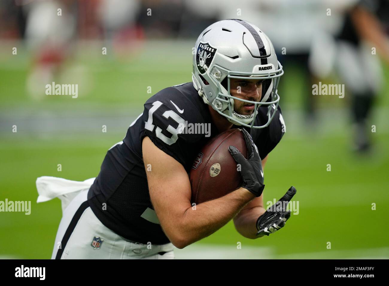 Las Vegas Raiders wide receiver Hunter Renfrow (13) warms up